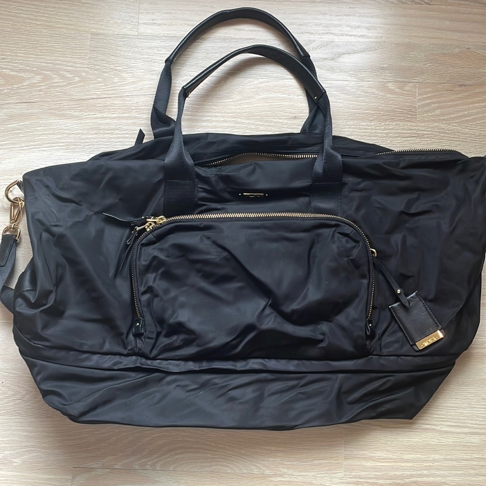 Tumi expandable black travel tote